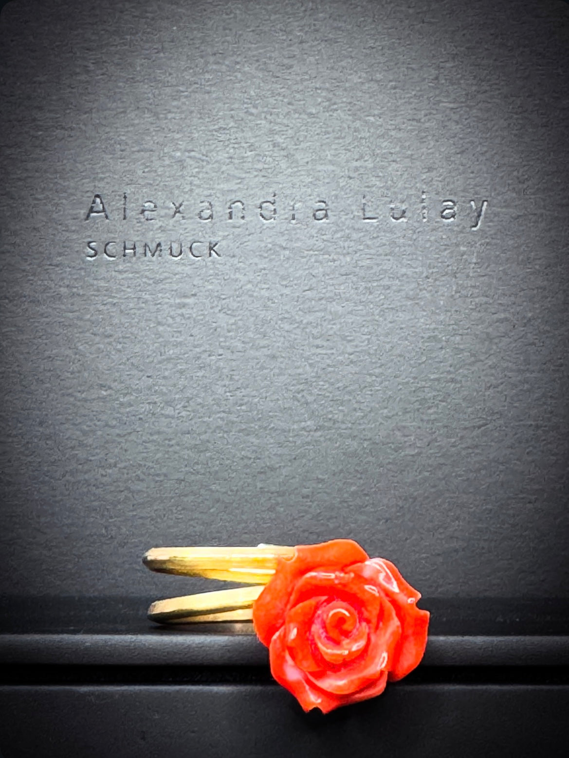Ring mit orange-roter Korallrose